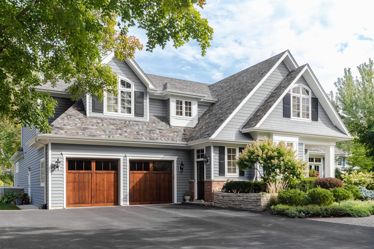 Long Island home with a wide driveway suitable for heating oil truck access